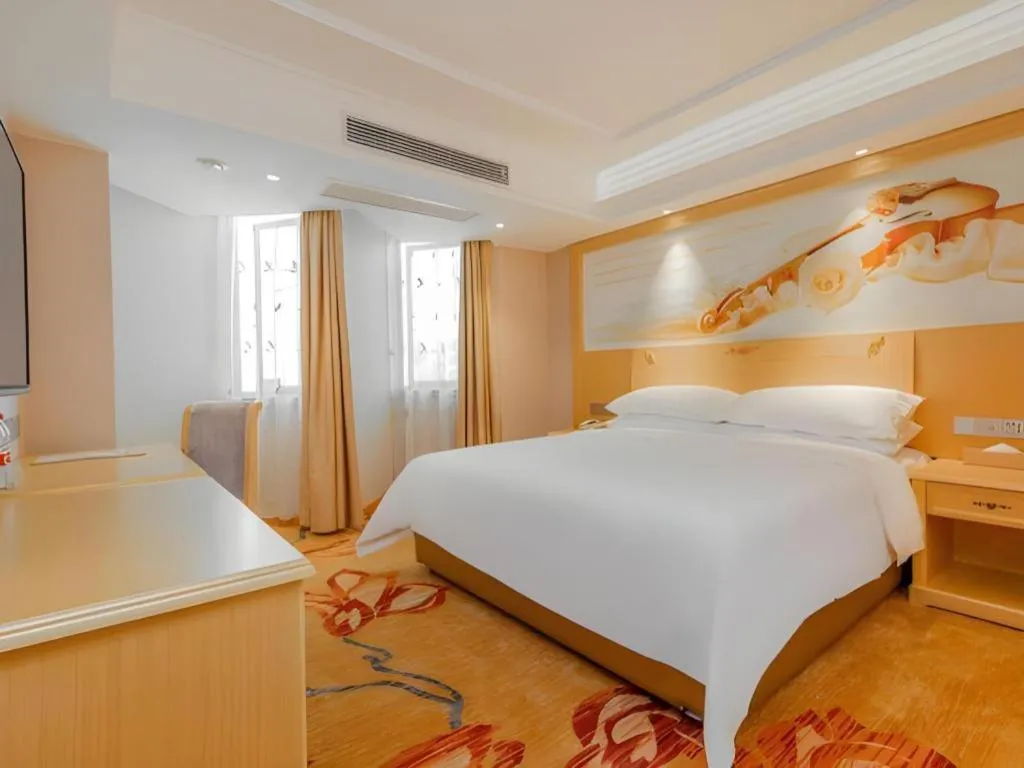 Bed in Vienna Hotel Guangxi Hezhou Guposhan Suifeng