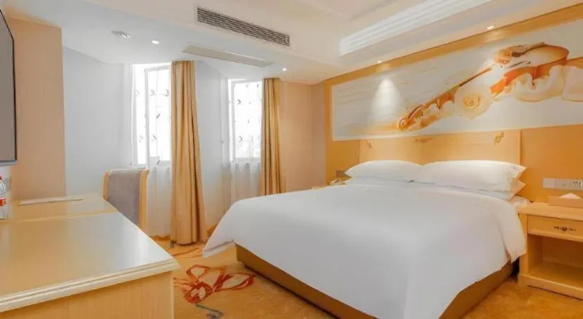 Bed in Vienna Hotel Guangxi Hezhou Guposhan Suifeng