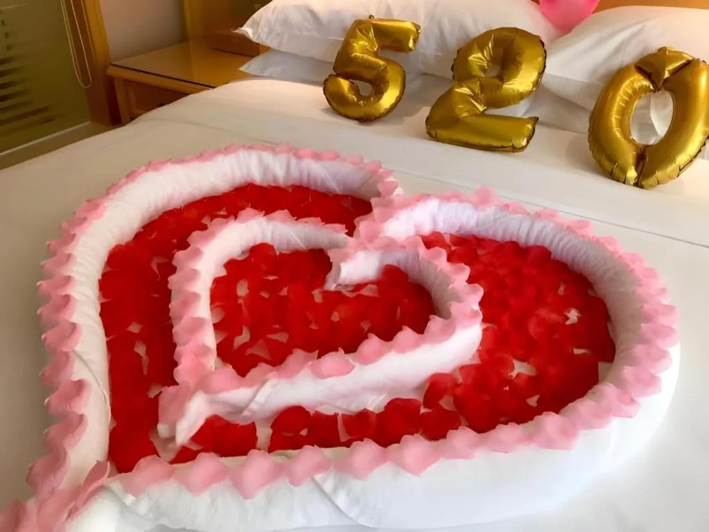 Bed in Vienna Hotel Guangxi Hezhou Guposhan Suifeng