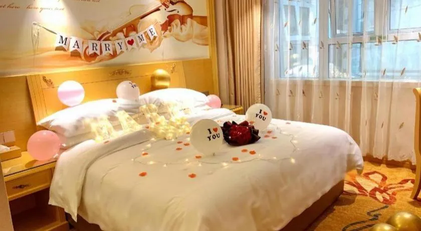 Bed in Vienna Hotel Guangxi Hezhou Guposhan Suifeng