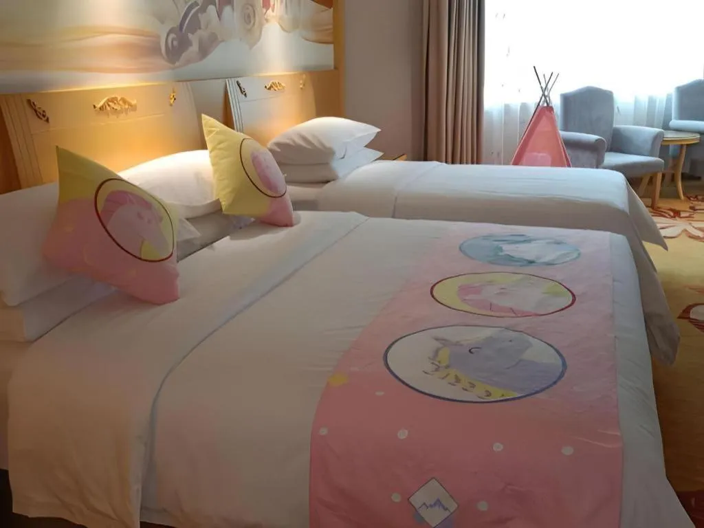 Bed in Vienna Hotel Guangxi Hezhou Guposhan Suifeng