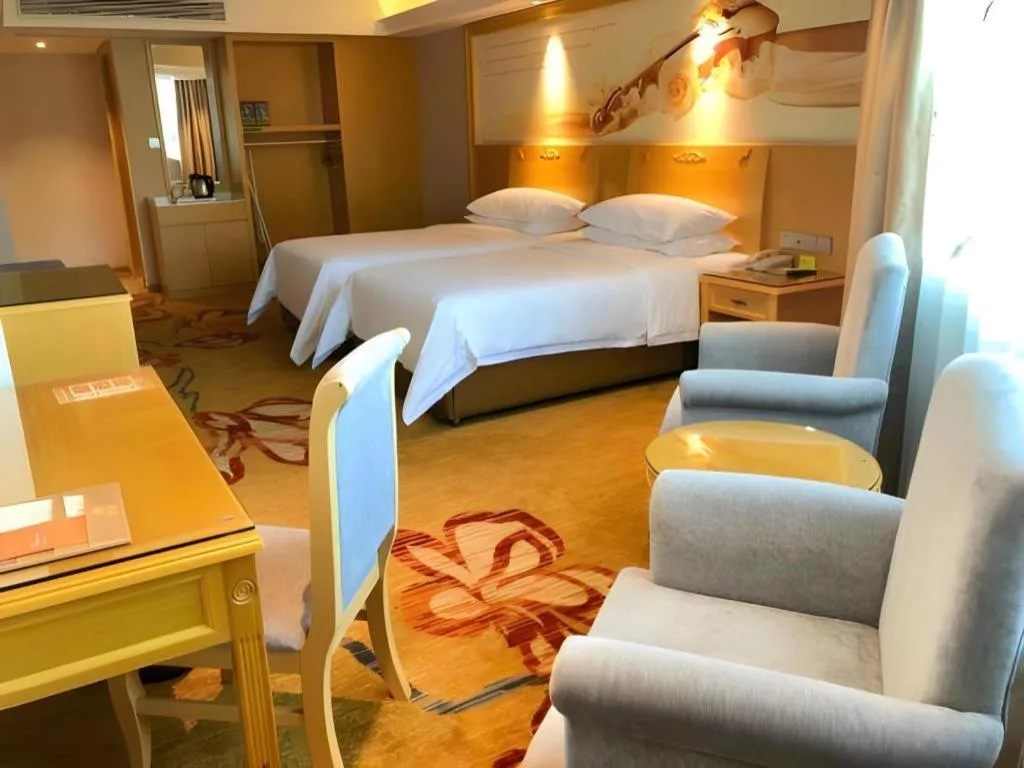 Bed in Vienna Hotel Guangxi Hezhou Guposhan Suifeng