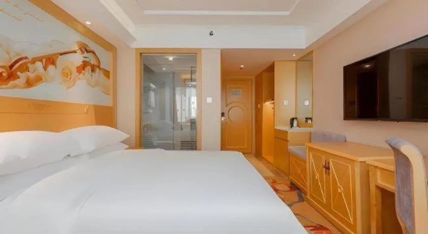 Bed in Vienna Hotel Guangxi Hezhou Guposhan Suifeng