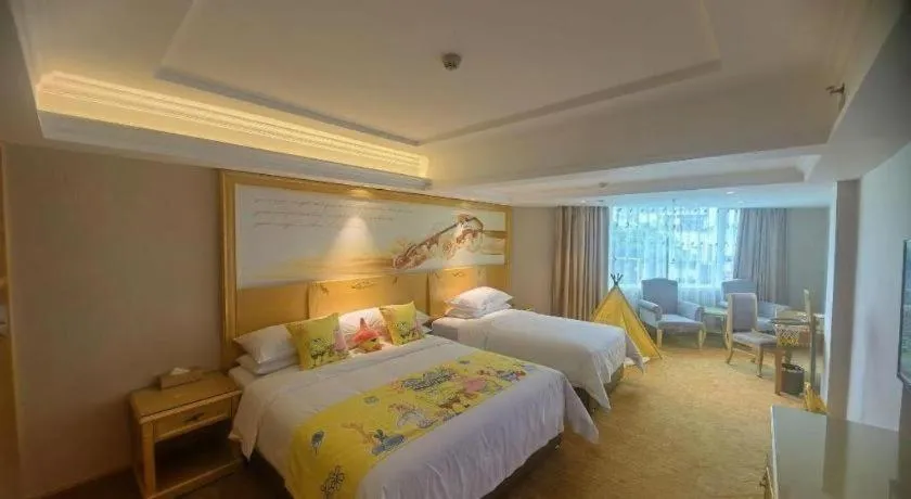 Bed in Vienna Hotel Guangxi Hezhou Guposhan Suifeng