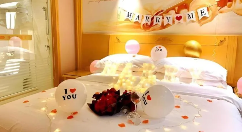 Bed in Vienna Hotel Guangxi Hezhou Guposhan Suifeng