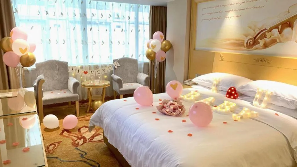 Bed in Vienna Hotel Guangxi Hezhou Guposhan Suifeng