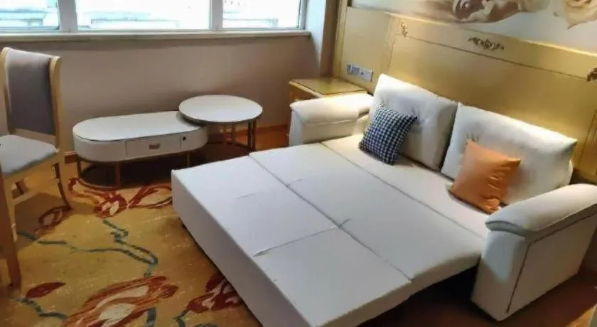 Bed in Vienna Hotel Guangxi Hezhou Guposhan Suifeng