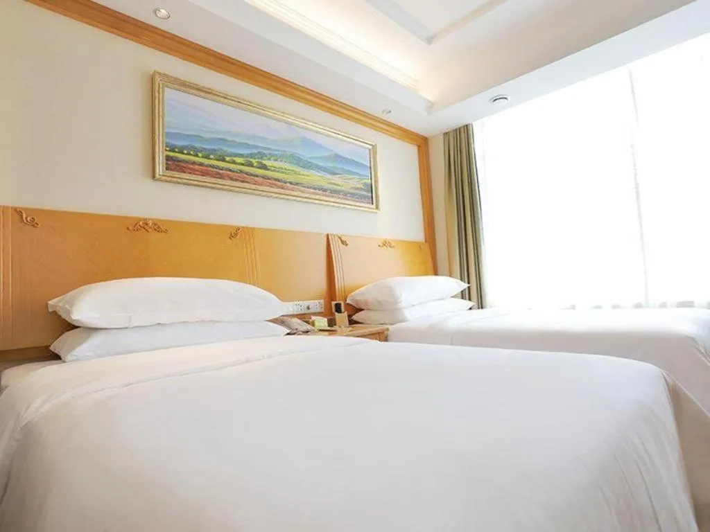 Bed in Vienna Hotel Shenyang Central Street