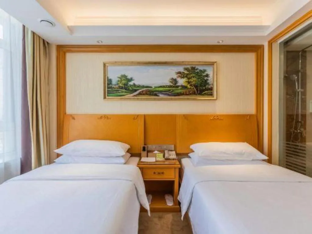 Bed in Vienna Hotel Shenyang Central Street