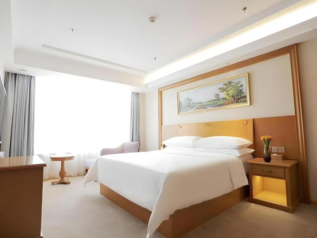 Bed in Vienna Hotel Shenyang Central Street