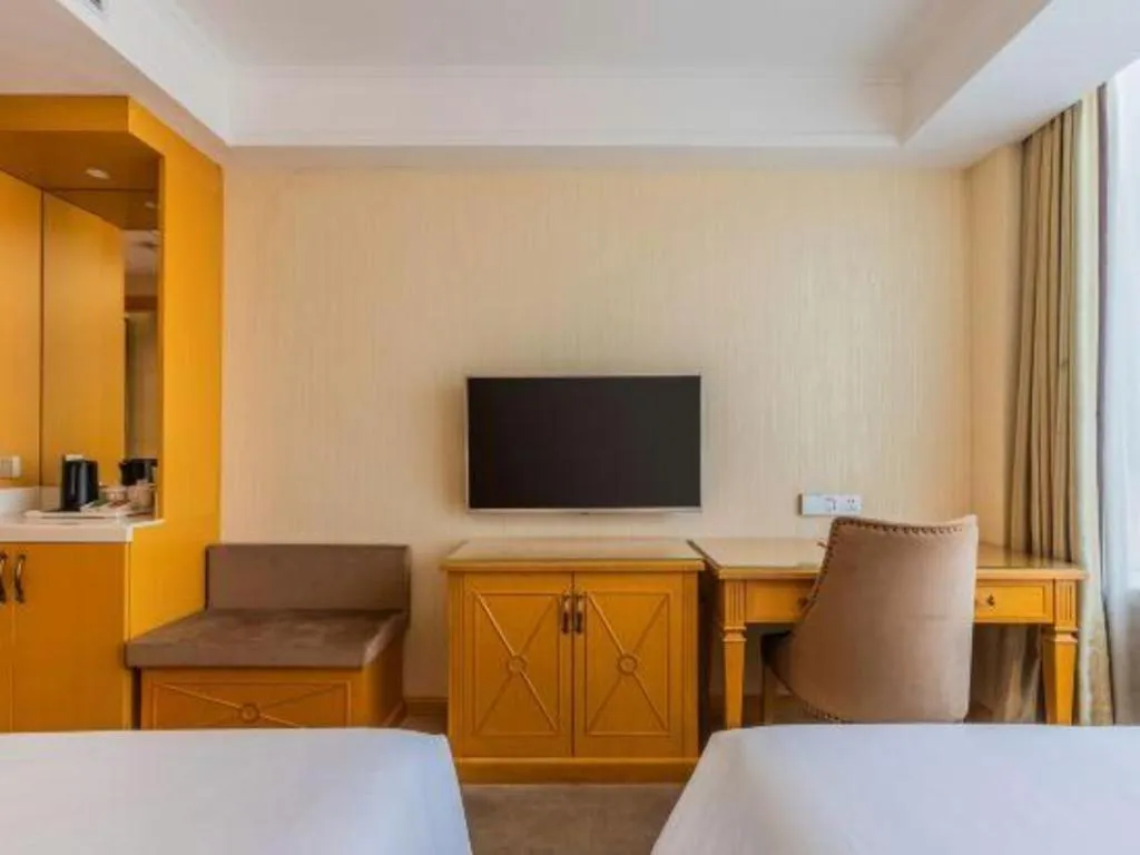 Bed in Vienna Hotel Shenyang Central Street