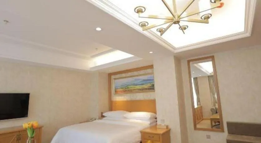 Bed in Vienna Hotel Shenyang Central Street