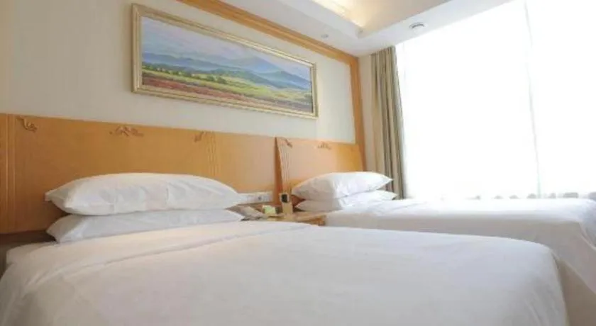 Bed in Vienna Hotel Shenyang Central Street