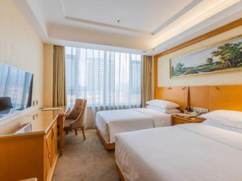 Bed in Vienna Hotel Shenyang Central Street