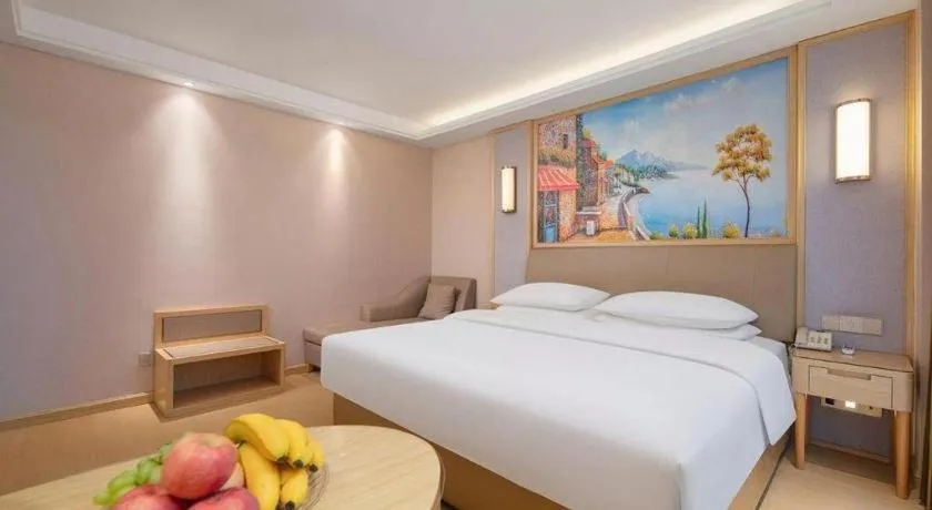 Bed in Vienna Hotel Guizhou Liupanshui Shuicheng Ancient Town