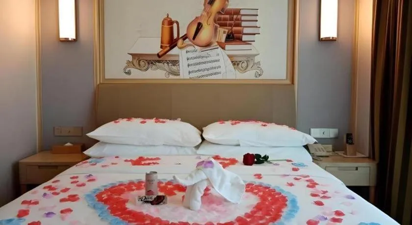 Bed in Vienna Hotel Guizhou Liupanshui Shuicheng Ancient Town