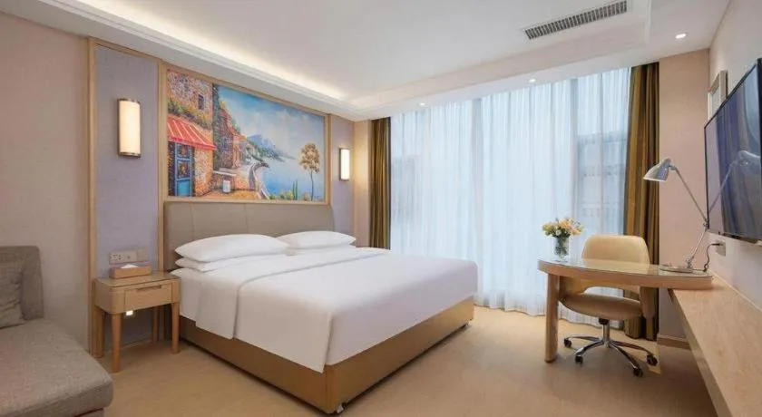 Bed in Vienna Hotel Guizhou Liupanshui Shuicheng Ancient Town