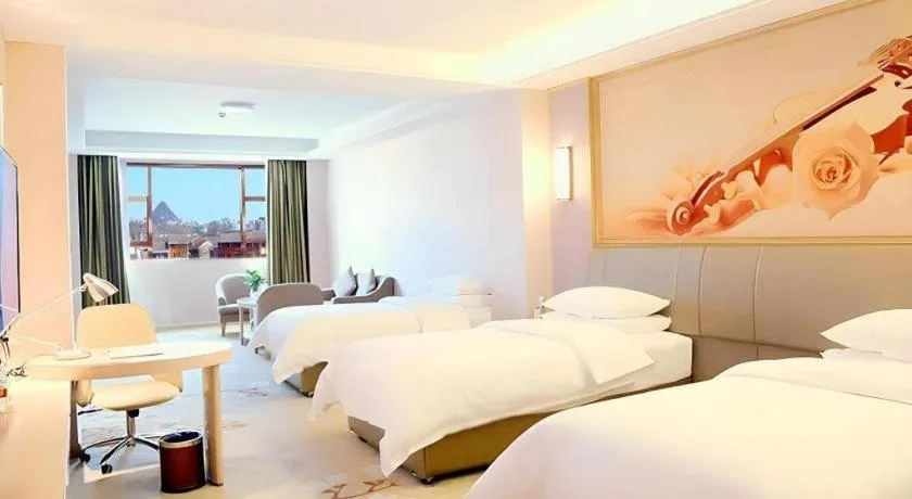 Bed in Vienna Hotel Guizhou Liupanshui Shuicheng Ancient Town