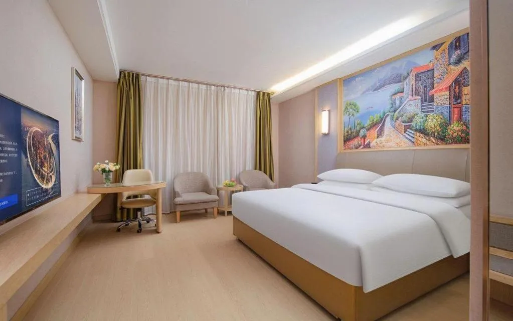 Bed in Vienna Hotel Guizhou Liupanshui Shuicheng Ancient Town