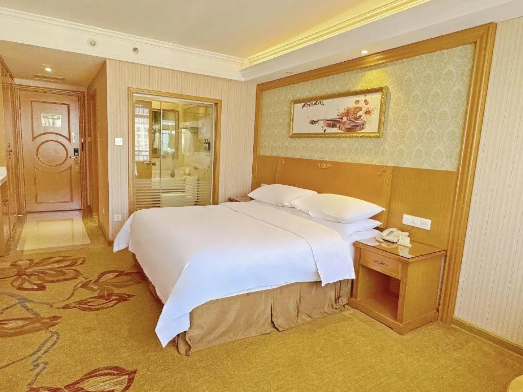 Bed in Vienna Hotel Guangxi Guilin Xing'an