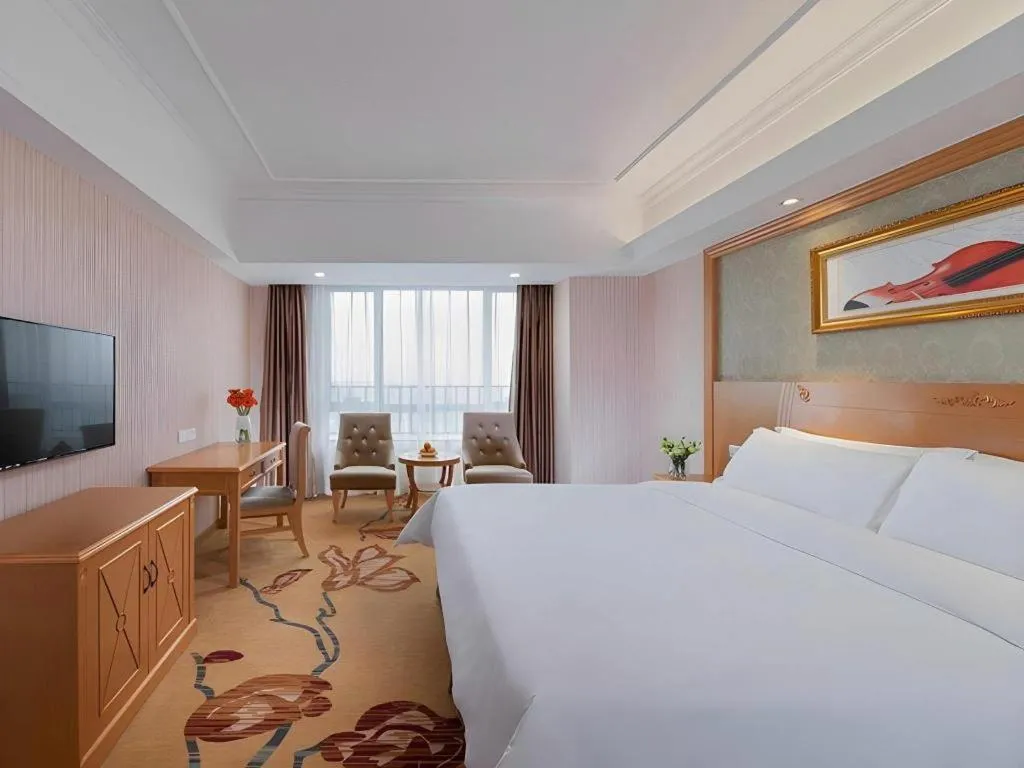 Bed in Vienna Hotel Guangxi Guilin Xing'an