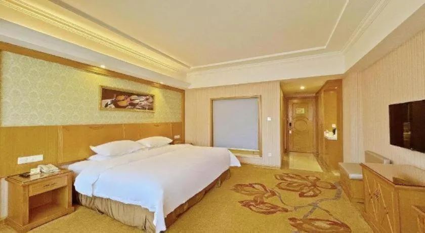 Bed in Vienna Hotel Guangxi Guilin Xing'an