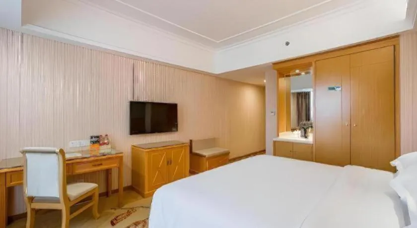 Bed in Vienna Hotel Guangxi Guilin Xing'an