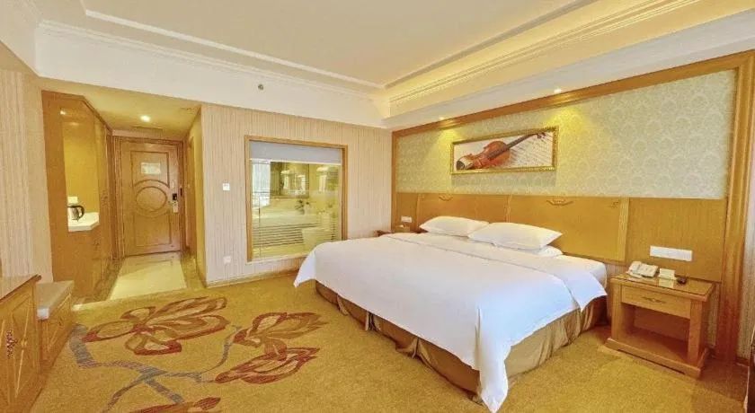 Bed in Vienna Hotel Guangxi Guilin Xing'an