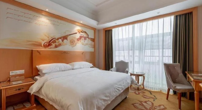 Bed in Vienna Hotel Hunan Yueyang Linxiang