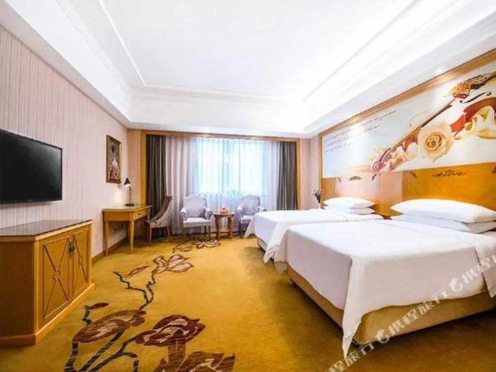 Bed in Vienna Hotel Hunan Yueyang Linxiang