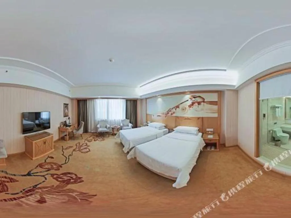 Bed in Vienna Hotel Hunan Yueyang Linxiang
