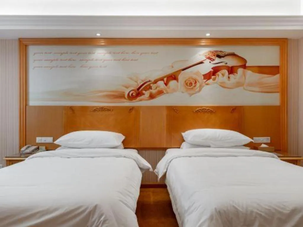 Bed in Vienna Hotel Hunan Yueyang Linxiang