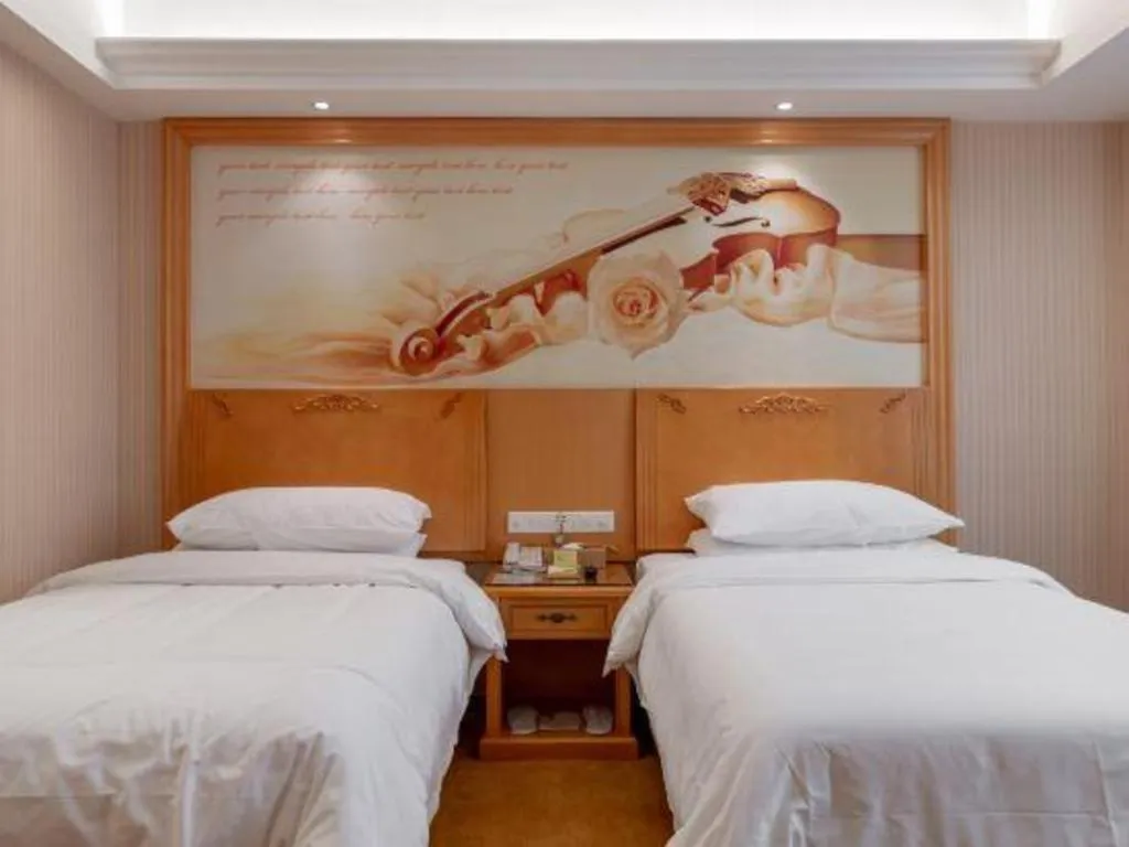 Bed in Vienna Hotel Hunan Yueyang Linxiang