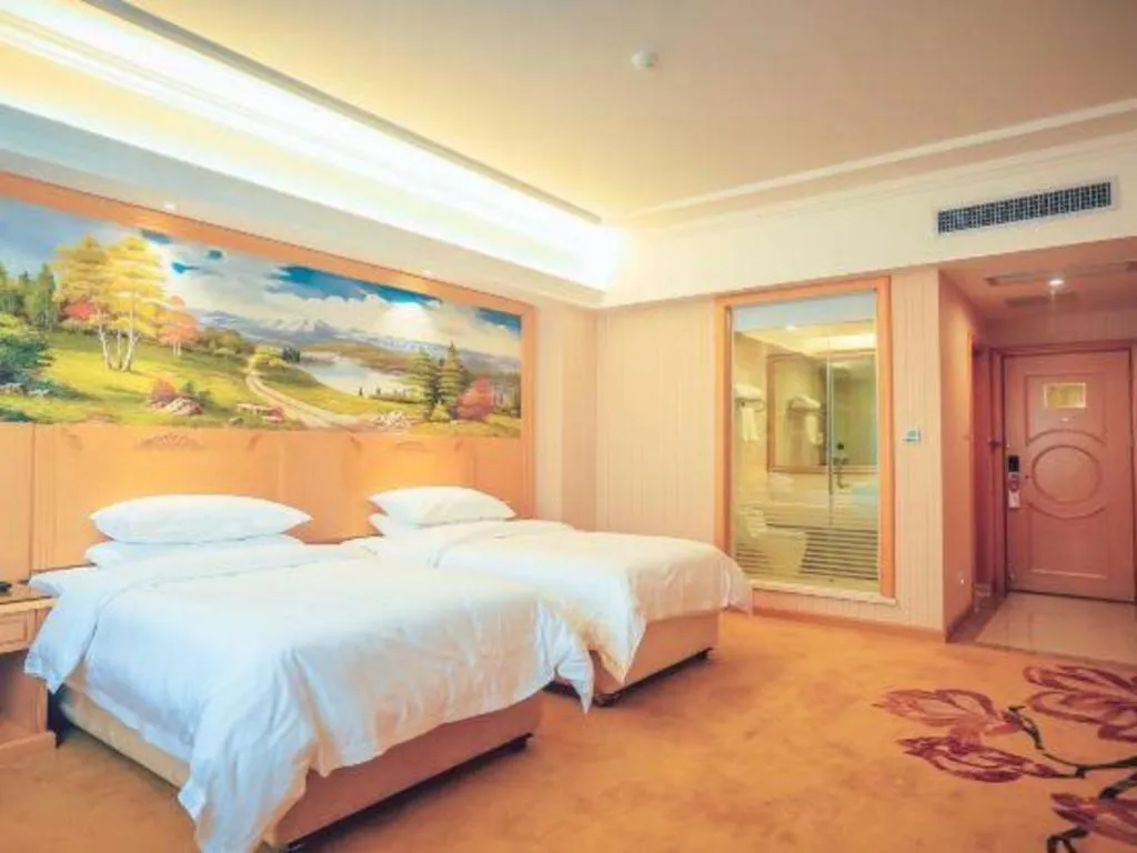 Bed in Vienna Hotel Hunan Yueyang Linxiang