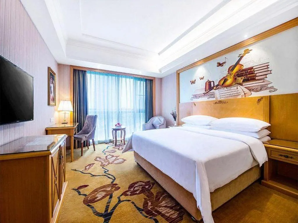 Bed in Vienna Hotel Hunan Yueyang Linxiang
