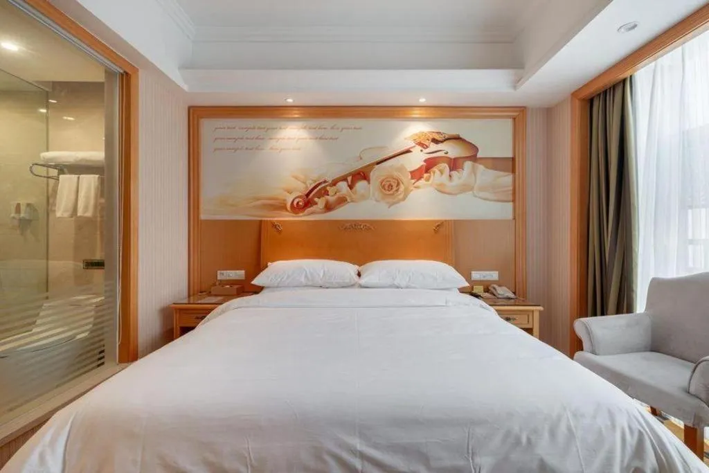 Bed in Vienna Hotel Hunan Yueyang Linxiang