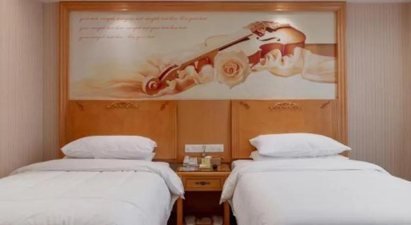 Bed in Vienna Hotel Hunan Yueyang Linxiang