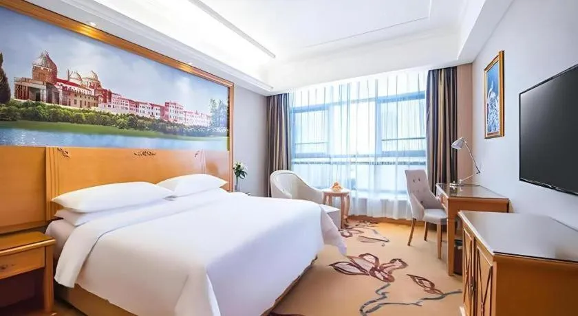 Bed in Vienna Hotel Hunan Yueyang Linxiang