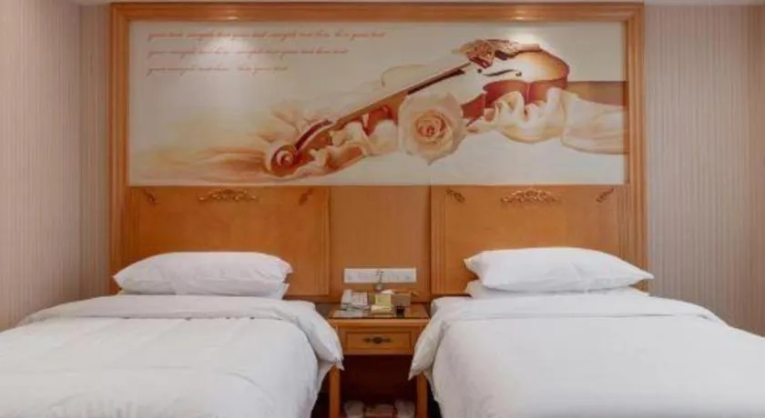 Bed in Vienna Hotel Hunan Yueyang Linxiang