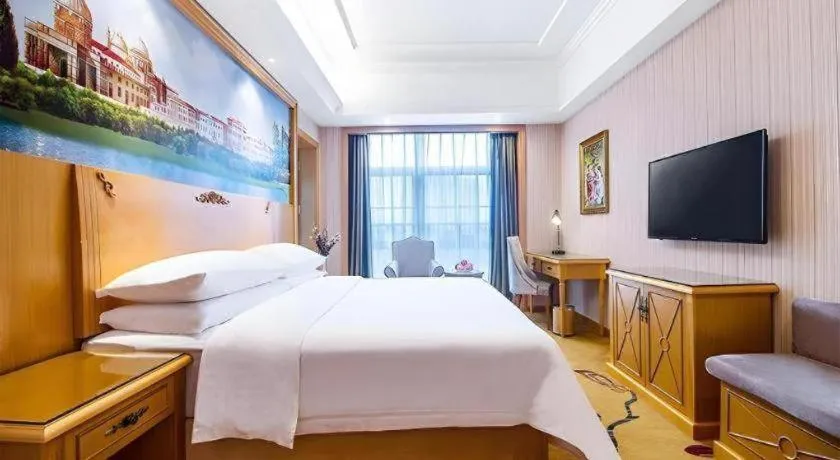 Bed in Vienna Hotel Hunan Yueyang Linxiang