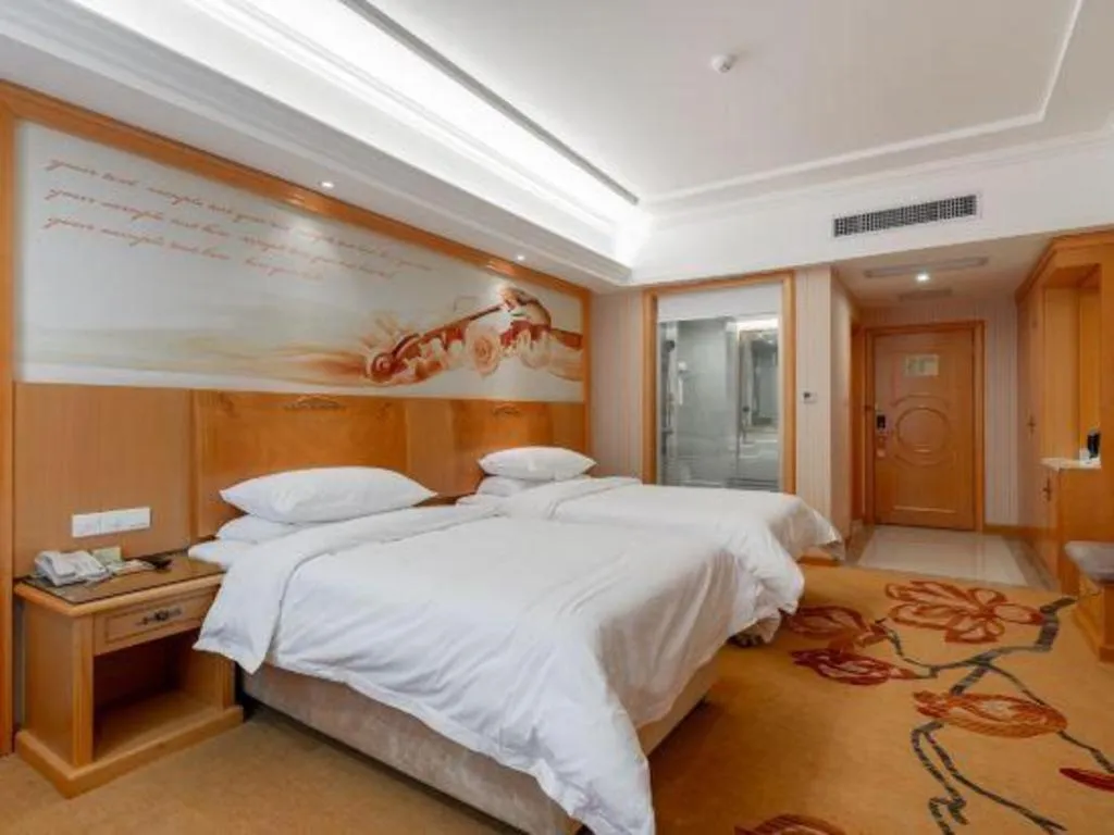 Bed in Vienna Hotel Hunan Yueyang Linxiang