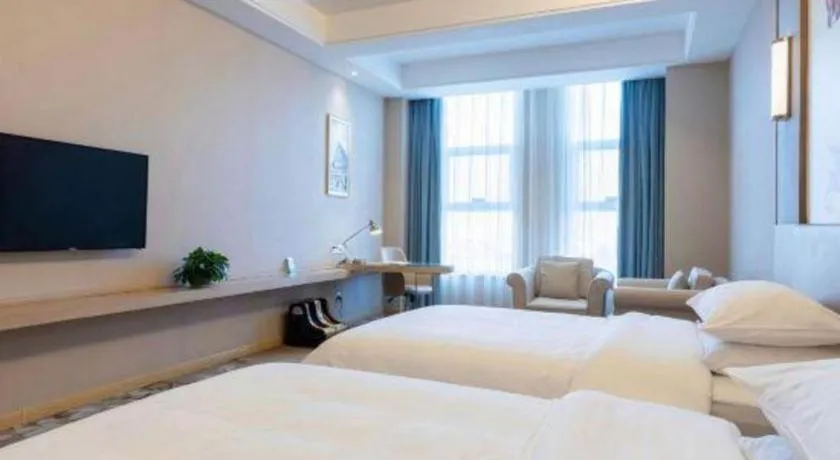 Bed in Vienna Hotel Jinan Railway Station