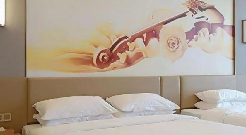 Bed in Vienna Hotel Jinan Railway Station