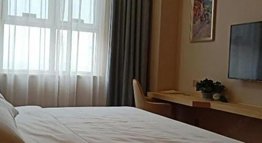 Bed in Vienna Hotel Jinan Railway Station