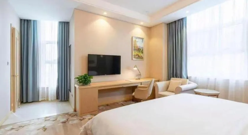 Bed in Vienna Hotel Jinan Railway Station