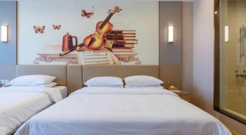 Bed in Vienna Hotel Jinan Railway Station