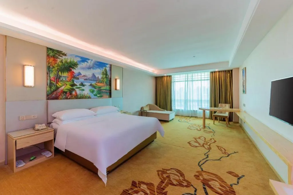 Bed in Vienna Hotel Guangdong Huizhou High-Speed North Railway Station Xiaojinkou