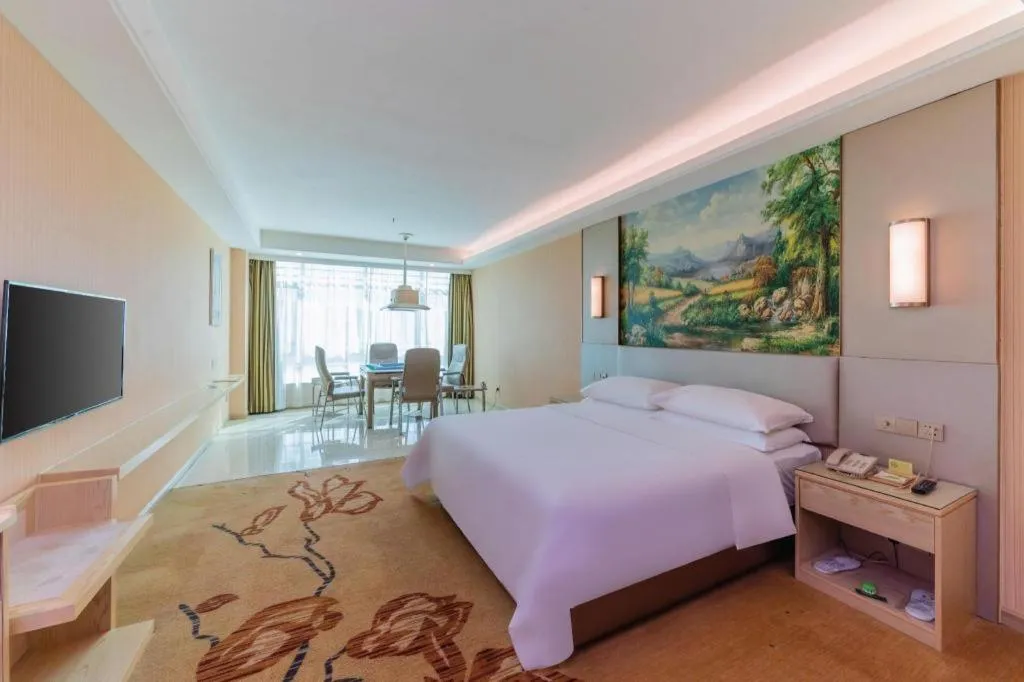Bed in Vienna Hotel Guangdong Huizhou High-Speed North Railway Station Xiaojinkou