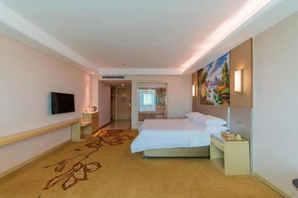 Bed in Vienna Hotel Guangdong Huizhou High-Speed North Railway Station Xiaojinkou
