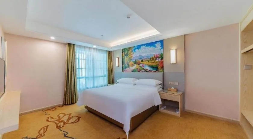 Bed in Vienna Hotel Guangdong Huizhou High-Speed North Railway Station Xiaojinkou